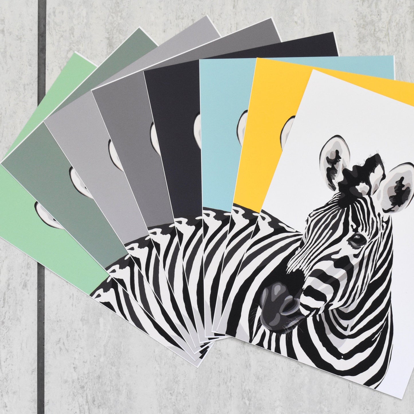 Set of prints with zebra design on a wooden surface