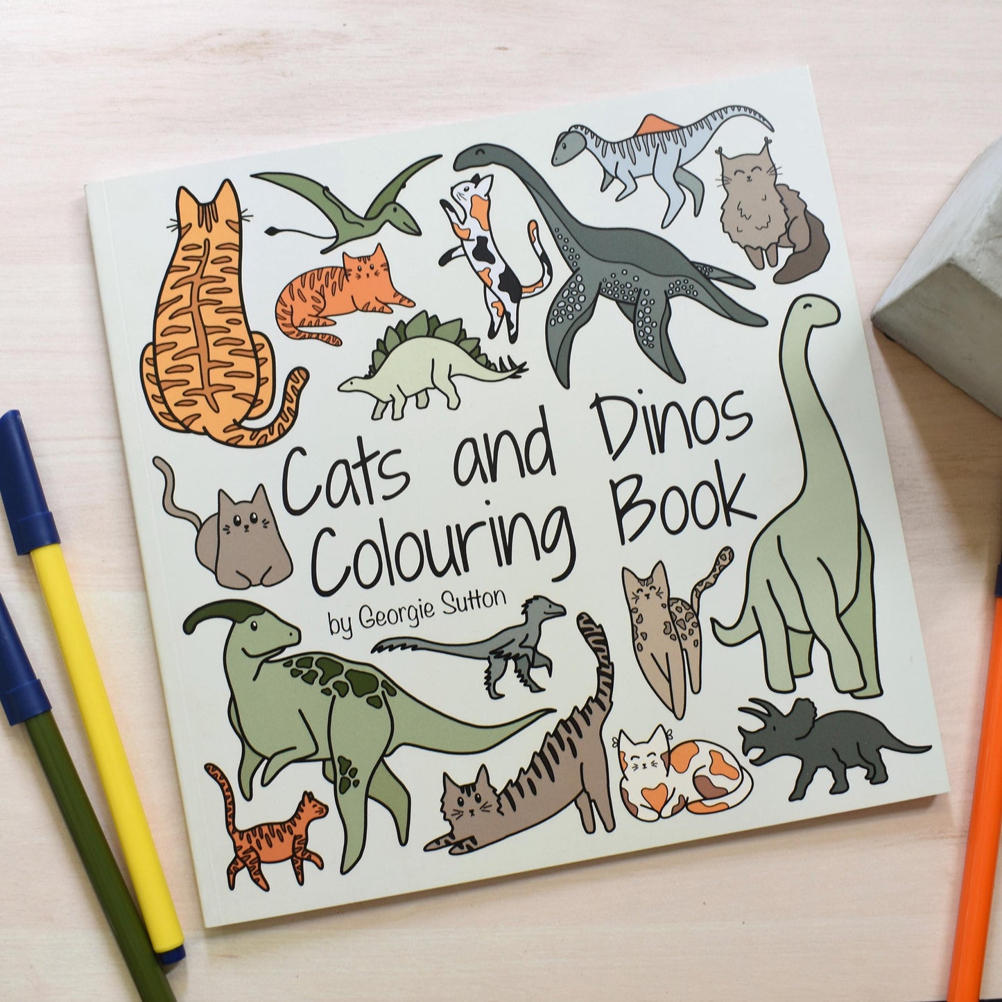 Cat and Dino Colouring Book
