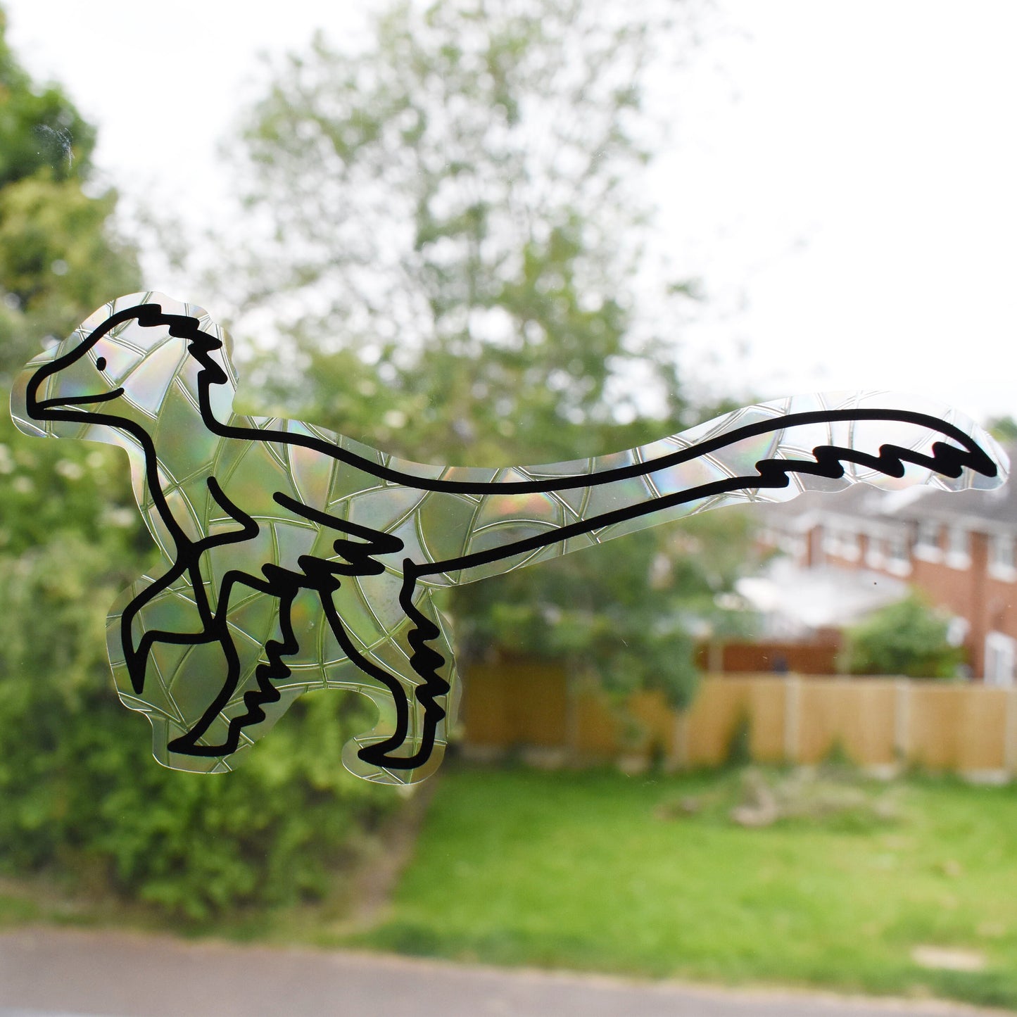 Velociraptor Suncatcher