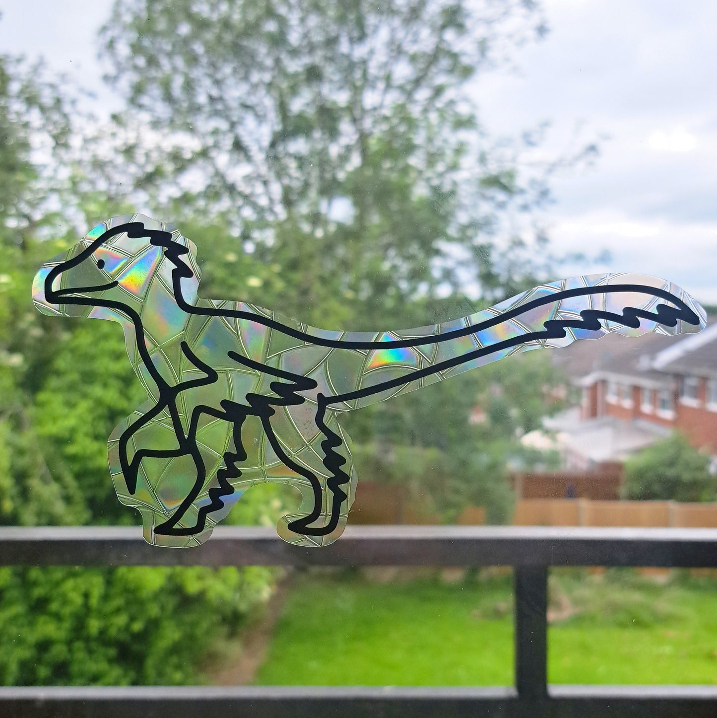 Velociraptor Suncatcher