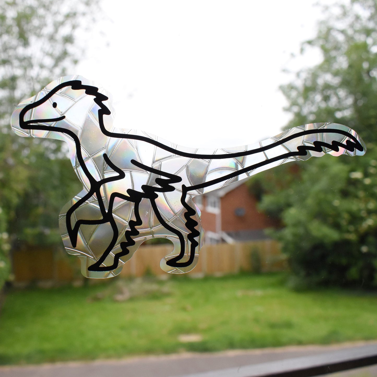 Velociraptor Suncatcher